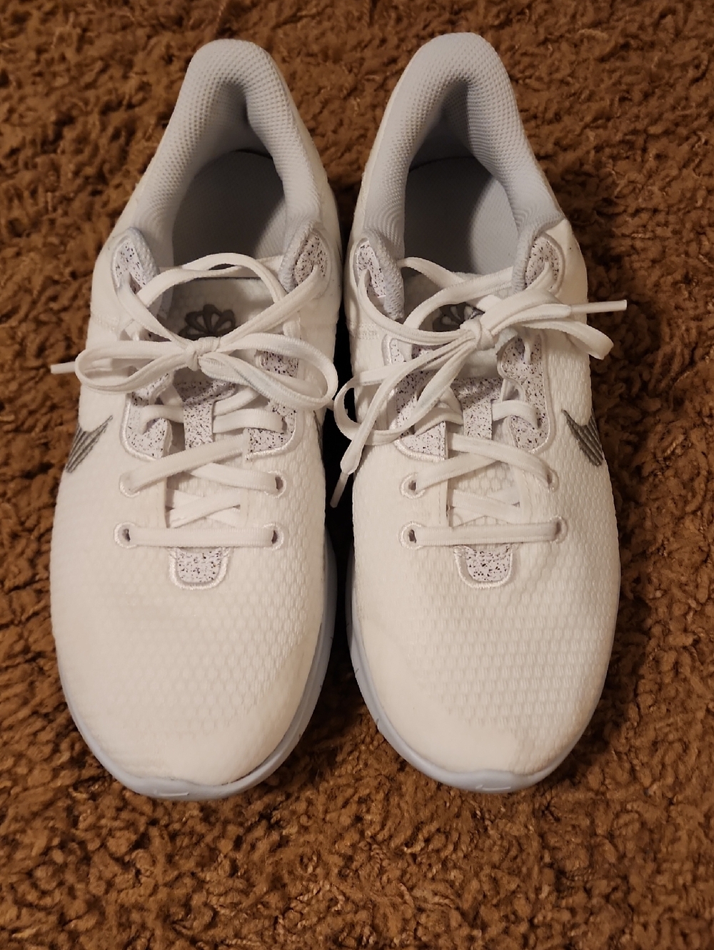 Nike Women's White Athletic Sneakers with Silver Swoosh